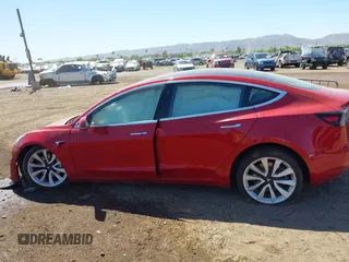 2018 Tesla Model 3 Long Range Battery with VIN 5YJ3E1EA3JF163654, listed as a IAAI auction lot 42193809 with Not Provided miles and . Bid and sale history available at DreamBid. Image 14.