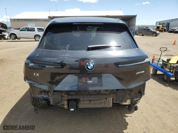 2023 BMW iX xDrive50 with VIN WB523CF03PCM09655, listed as a Copart auction lot 52922124 with 3,159 mi miles. Bid and sale history available at carsss.com. Image 6.