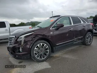 2018 Cadillac XT5 Premium Luxury FWD z VIN 1GYKNERS5JZ127703, wystawiony jako Copart lot #58315215 z przebiegiem Nie podano mil oraz Szkody całkowita. Historia ofert i sprzedaży dostępna na DreamBid. Obrazek 1.