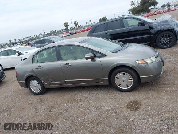 2006 Honda Civic z VIN JHMFA36286S006836, wystawiony jako IAAI lot #42324244 z przebiegiem 217 417 mil mil oraz . Historia ofert i sprzedaży dostępna na DreamBid. Obrazek 13.