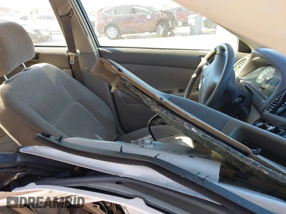 2004 Toyota Camry LE with VIN 4T1BF30KX4U065023, listed as a IAAI auction lot 41085725 with 278,218 mi miles. Bid and sale history available at carsss.com. Image 5.