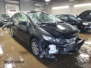 2011 Honda Insight LX z VIN JHMZE2H54BS009715, wystawiony jako Copart lot #48790825 z przebiegiem 219 867 mil mil oraz Szkoda całkowita • Salvage title. Historia ofert i sprzedaży dostępna na DreamBid. Obrazek 4.