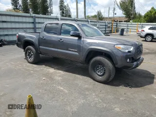 2021 Toyota Tacoma SR z VIN 5TFCZ5AN9MX265197, wystawiony jako Copart lot #51217585 z przebiegiem 44 175 mil mil oraz Czysty tytuł • Clean title. Historia ofert i sprzedaży dostępna na DreamBid. Obrazek 4.