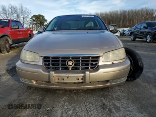 1998 Cadillac Catera z VIN W06VR52R5WR014681, wystawiony jako Copart lot #44159985 z przebiegiem 90 059 mil mil oraz Szkoda całkowita • Salvage title. Historia ofert i sprzedaży dostępna na DreamBid. Obrazek 5.