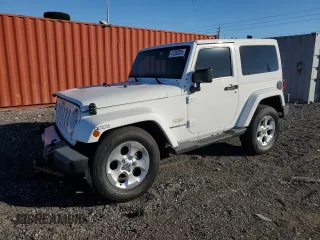 2015 Jeep Wrangler Sahara z VIN 1C4AJWBG1FL649148, wystawiony jako Copart lot #49158805 z przebiegiem 86 484 mil mil oraz Szkoda całkowita • Salvage title. Historia ofert i sprzedaży dostępna na DreamBid. Obrazek 1.