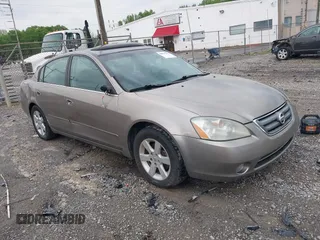 2003 Nissan Altima S with VIN 1N4AL11D33C252059, listed as a IAAI auction lot 42079201 with 152,510 mi miles. Bid and sale history available at carsss.com. Image 1.