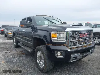 2019 GMC Sierra 2500HD Denali with VIN 1GT12SEY9KF137673, listed as a IAAI auction lot 41274118 with 1 mi miles. Bid and sale history available at carsss.com. Image 1.