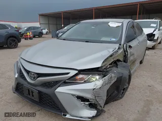 2018 Toyota Camry LE with VIN 4T1B11HK2JU079694, listed as a IAAI auction lot 41930753 with 171,984 mi miles. Bid and sale history available at carsss.com. Image 2.