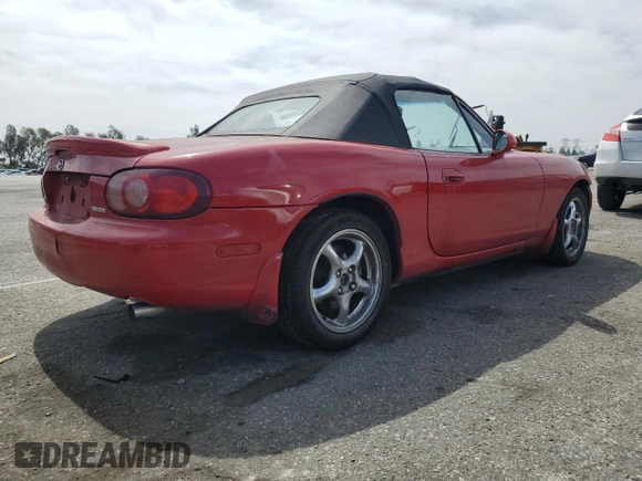 2001 Mazda MX-5 Miata with VIN JM1NB353610216294, listed as a Copart auction lot 56714505 with Not provided miles and Salvage title. Bid and sale history available at DreamBid. Image 3.