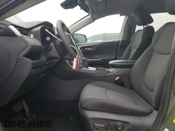 2024 Toyota RAV4 Hybrid LE with VIN 2T3UWRFV2RW233698, listed as a Copart auction lot 58485325 with 6,873 mi miles and Salvage title. Bid and sale history available at DreamBid. Image 7.