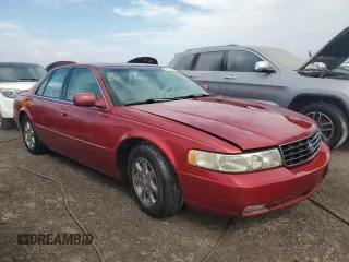 1999 Cadillac Seville Touring STS z VIN 1G6KY5496XU926352, wystawiony jako Copart lot #74711014 z przebiegiem 140 915 mil mil oraz Nie do naprawy • Non repairable. Historia ofert i sprzedaży dostępna na DreamBid. Obrazek 4.