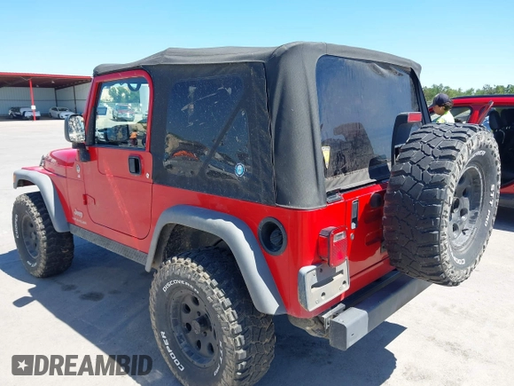 2005 Jeep Wrangler SE with VIN 1J4FA29S45P311320, listed as a IAAI auction lot 42095396 with 93,808 mi miles. Bid and sale history available at carsss.com. Image 3.