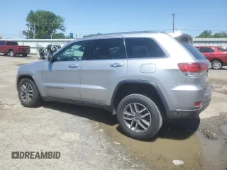 2020 Jeep Grand Cherokee Limited with VIN 1C4RJFBG4LC302606, listed as a Copart auction lot 56907015 with 116,713 mi miles and Salvage title. Bid and sale history available at DreamBid. Image 2.