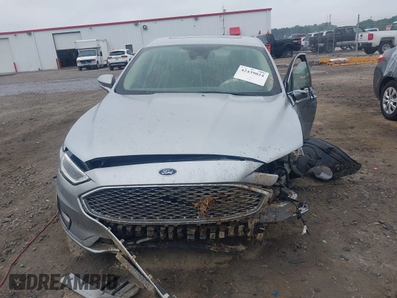2020 Ford Fusion Titanium with VIN 3FA6P0D99LR138127, listed as a IAAI auction lot 42439024 with 128,792 mi miles and . Bid and sale history available at DreamBid. Image 13.