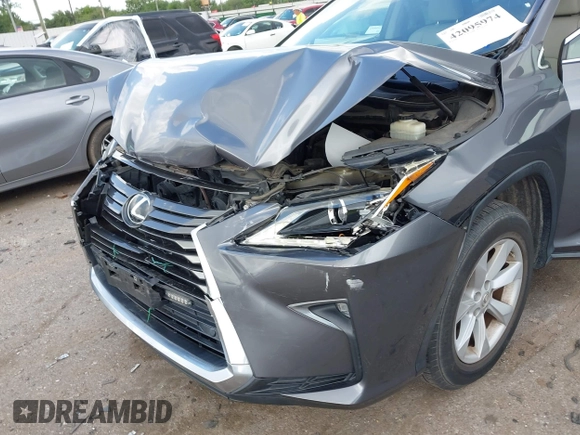 2016 Lexus RX 350 z VIN 2T2ZZMCA4GC032034, wystawiony jako IAAI lot #42095974 z przebiegiem 57 195 mil mil oraz . Historia ofert i sprzedaży dostępna na DreamBid. Obrazek 6.