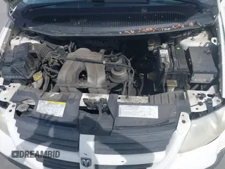 2005 Dodge Caravan SE with VIN 1D4GP25B45B287289, listed as a IAAI auction lot 42658990 with 217,918 mi miles and . Bid and sale history available at DreamBid. Image 10.