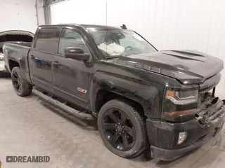 2016 Chevrolet Silverado 1500 LT with VIN 3GCUKRECXGG321066, listed as a IAAI auction lot 41374135 with 182,686 mi miles. Bid and sale history available at carsss.com. Image 1.