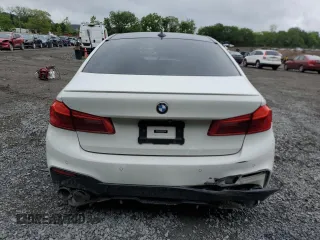 2019 BMW 5 Series M550i xDrive with VIN WBAJB9C54KB288569, listed as a Copart auction lot 58707235 with Not provided miles and Salvage title. Bid and sale history available at DreamBid. Image 6.