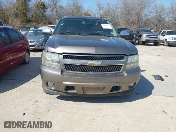 2011 Chevrolet Suburban LT with VIN 1GNSCJE03BR381301, listed as a IAAI auction lot 41412636 with 243,601 mi miles. Bid and sale history available at carsss.com. Image 12.