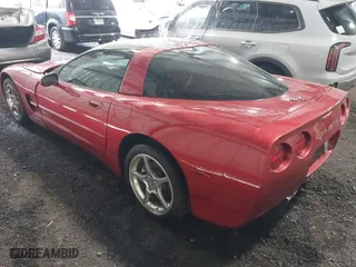 2001 Chevrolet Corvette with VIN 1G1YY22G515113067, listed as a IAAI auction lot 40221194 with 87,020 mi miles. Bid and sale history available at carsss.com. Image 3.