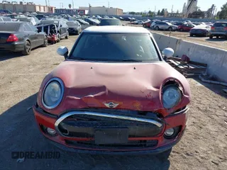 2016 MINI Clubman z VIN WMWLN5C51G2E30234, wystawiony jako IAAI lot #41408299 z przebiegiem 81 895 mil mil oraz . Historia ofert i sprzedaży dostępna na DreamBid. Obrazek 13.