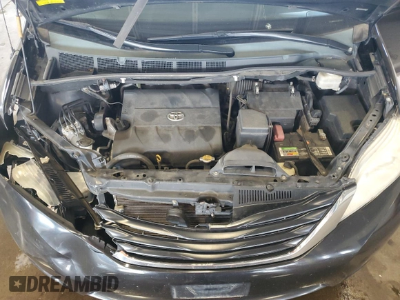 2013 Toyota Sienna LE AAS with VIN 5TDKK3DC7DS280463, listed as a Copart auction lot 61393215 with 195,785 mi miles and Salvage title. Bid and sale history available at DreamBid. Image 12.