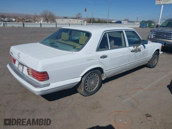 1989 Mercedes-Benz 560 with VIN WDBCA39DXKA433631, listed as a IAAI auction lot 41687132 with 137,621 mi miles and . Bid and sale history available at DreamBid. Image 4.