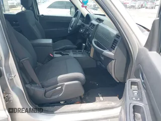 2012 Jeep Liberty Sport z VIN 1C4PJLAK0CW111694, wystawiony jako IAAI lot #42667595 z przebiegiem 78 451 mil mil oraz . Historia ofert i sprzedaży dostępna na DreamBid. Obrazek 5.