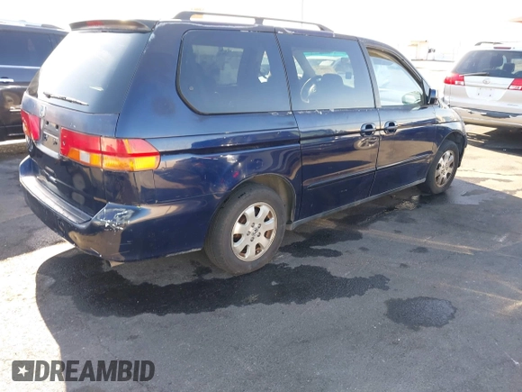 2004 Honda Odyssey EX z VIN 5FNRL18614B080980, wystawiony jako IAAI lot #41940014 z przebiegiem 233 465 mil mil oraz . Historia ofert i sprzedaży dostępna na DreamBid. Obrazek 4.