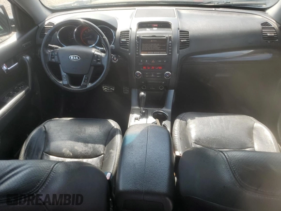 2012 Kia Sorento SX z VIN 5XYKW4A28CG193611, wystawiony jako Copart lot #57659935 z przebiegiem 203 349 mil mil oraz Szkoda całkowita • Salvage title. Historia ofert i sprzedaży dostępna na DreamBid. Obrazek 8.