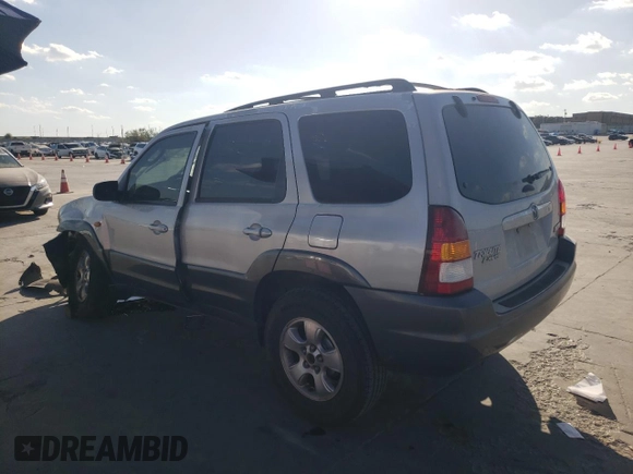 2002 Mazda Tribute LX with VIN 4F2YU09182KM64860, listed as a Copart auction lot 77391824 with 207,965 mi miles and Salvage Title. Bid and sale history available at DreamBid. Image 2.