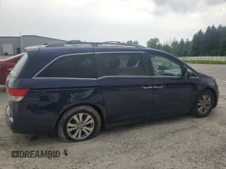 2014 Honda Odyssey EX-L with VIN 5FNRL5H63EB013483, listed as a Copart auction lot 63002435 with 127,059 mi miles and Salvage title. Bid and sale history available at DreamBid. Image 3.