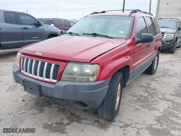 2004 Jeep Grand Cherokee Laredo with VIN 1J4GX48S14C259215, listed as a IAAI auction lot 41906121 with 142,668 mi miles. Bid and sale history available at carsss.com. Image 2.