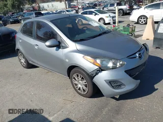 2014 Mazda 2 Sport z VIN JM1DE1KZ5E0182774, wystawiony jako IAAI lot #41657662 z przebiegiem 156 821 mil mil oraz . Historia ofert i sprzedaży dostępna na DreamBid. Obrazek 1.