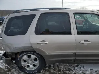 2001 Mazda Tribute LX with VIN 4F2CU081X1KM70119, listed as a Copart auction lot 89311935 with 176,851 mi miles and Salvage Title. Bid and sale history available at DreamBid. Image 11.