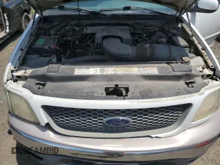 2000 Ford F-150 XL с VIN 1FTPF18L2YNA18807, выставлен на аукционе Copart как лот 62648305 с пробегом Не указан миль и Списание • Salvage title. История ставок и продаж доступна на DreamBid. Изображение 11.