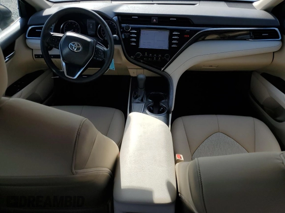 2018 Toyota Camry LE with VIN 4T1B11HK0JU565596, listed as a Copart auction lot 60219235 with 9,809 mi miles and Salvage title. Bid and sale history available at DreamBid. Image 8.