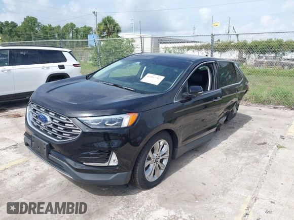 2020 Ford Edge Titanium with VIN 2FMPK4K93LBA05221, listed as a IAAI auction lot 42497787 with Not provided miles and . Bid and sale history available at DreamBid. Image 16.