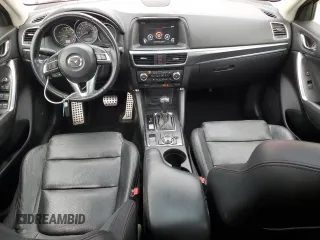 2016 Mazda CX-5 Grand Touring with VIN JM3KE4DY5G0660201, listed as a Copart auction lot 52165205 with 108,231 mi miles and Salvage Title. Bid and sale history available at DreamBid. Image 8.