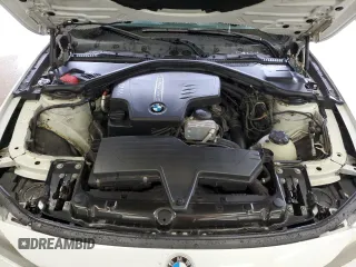 2013 BMW 3 Series 328i with VIN WBA3A5G52DNP18972, listed as a Copart auction lot 58122935 with 209,173 mi miles and Salvage title. Bid and sale history available at DreamBid. Image 12.