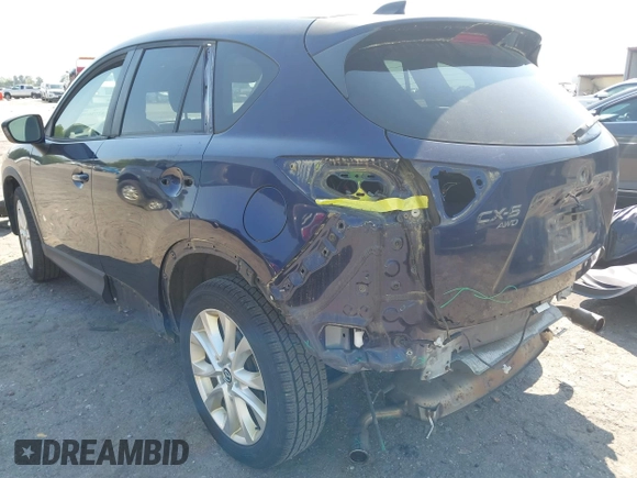 2014 Mazda CX-5 Grand Touring with VIN JM3KE4DYXE0342720, listed as a IAAI auction lot 42026388 with 114,072 mi miles and . Bid and sale history available at carsss.com. Image 3.