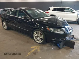 2015 Volkswagen CC R-Line with VIN WVWBP7AN8FE828106, listed as a IAAI auction lot 41867821 with 67,067 mi miles and . Bid and sale history available at DreamBid. Image 1.