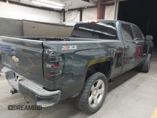 2017 Chevrolet Silverado 1500 LT with VIN 1GCUKREC4HF179560, listed as a IAAI auction lot 41460202 with 136,675 mi miles and . Bid and sale history available at DreamBid. Image 4.