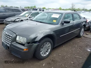 2009 Chrysler 300 LX with VIN 2C3KA43D49H558006, listed as a IAAI auction lot 42178195 with 208,864 mi miles and . Bid and sale history available at DreamBid. Image 18.