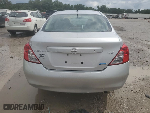 2012 Nissan Versa SV with VIN 3N1CN7AP9CL875493, listed as a Copart auction lot 63058395 with 204,253 mi miles and Salvage title. Bid and sale history available at DreamBid. Image 6.