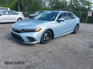 2023 Honda Civic Touring with VIN 2HGFE1F91PH305053, listed as a IAAI auction lot 42378311 with 41,576 mi miles and . Bid and sale history available at DreamBid. Image 18.