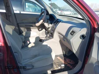 2005 Hyundai Tucson GLS with VIN KM8JN12D85U087248, listed as a IAAI auction lot 42034749 with 209,199 mi miles. Bid and sale history available at carsss.com. Image 5.