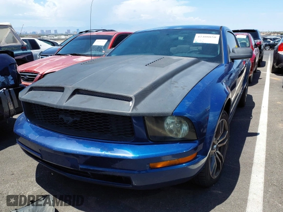 2007 Ford Mustang Deluxe z VIN 1ZVFT80N975241366, wystawiony jako IAAI lot #42408850 z przebiegiem 193 336 mil mil oraz . Historia ofert i sprzedaży dostępna na DreamBid. Obrazek 13.