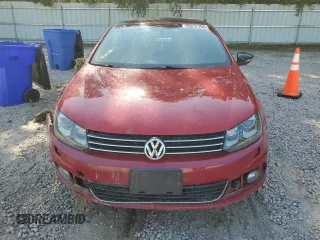 2014 Volkswagen Eos Sport z VIN WVWBW8AH9EV002933, wystawiony jako Copart lot #56212705 z przebiegiem 142 117 mil mil oraz Szkoda całkowita • Salvage title. Historia ofert i sprzedaży dostępna na DreamBid. Obrazek 5.