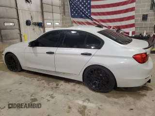 2013 BMW 3 Series 335i with VIN WBA3A9G51DNP36712, listed as a Copart auction lot 52407465 with 117,972 mi miles and Salvage title. Bid and sale history available at DreamBid. Image 2.
